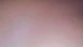 Ebony chick playing with boobs