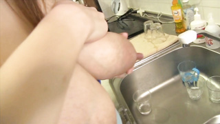 Asian Lactating woman with milk filled boobs