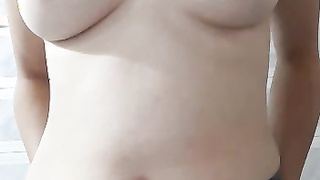 brunette topless in bathroom