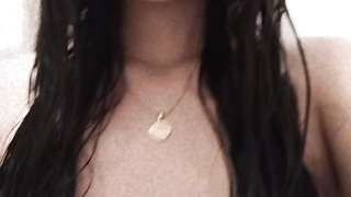 brunette with glasses masturbating