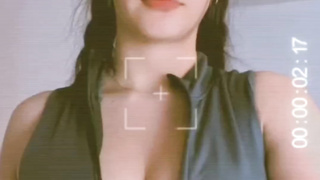 Latina with ponytails showing off